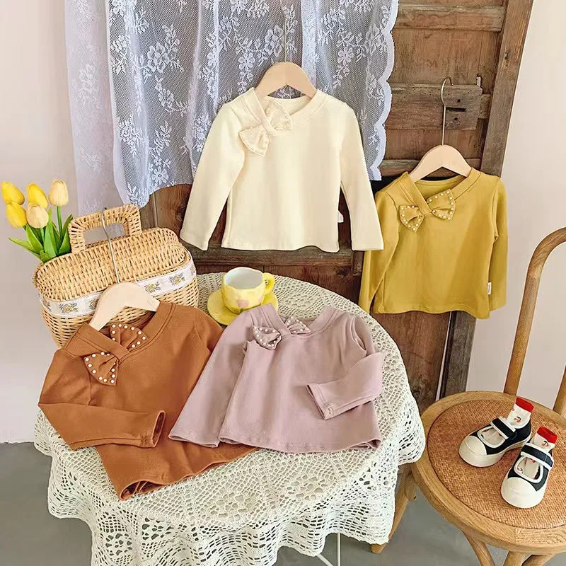 Pearl Bow Long Sleeve Top