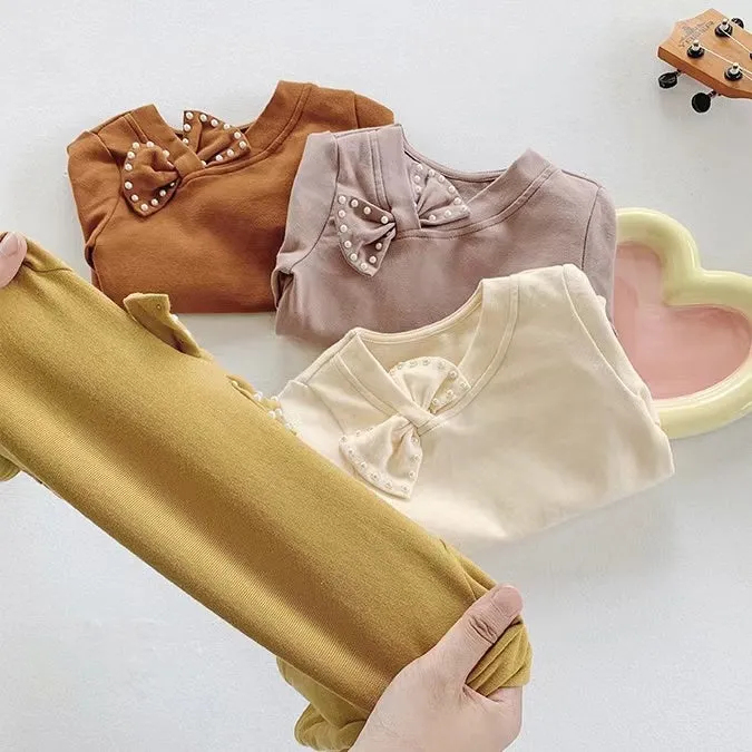 Pearl Bow Long Sleeve Top
